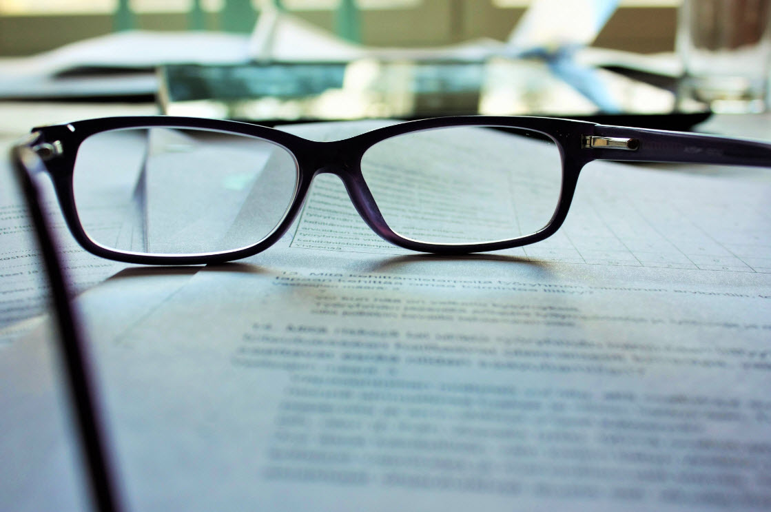 Newspaper and glasses