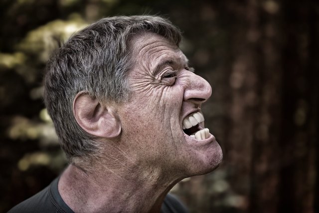 image of a frustrated man, showing day trading red flags emotion on his face