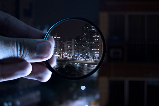 Magnifying glass, representing the concept of how to trade forex with a small account.