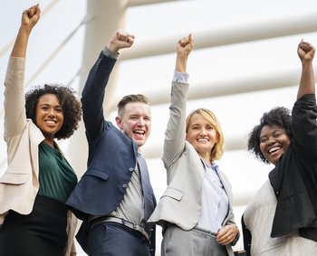 a bunch of women and men looking happy with their hedge fund career path jobs