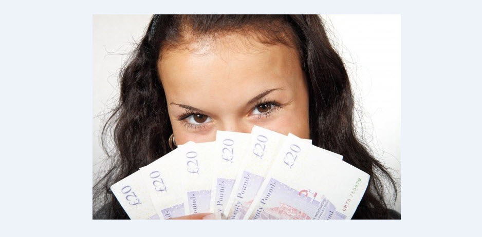 image of a girl holding cash that thinks about currency market exchange 